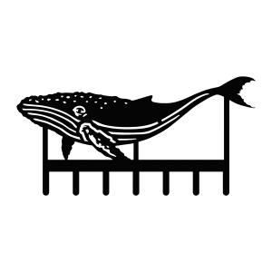 A black, steel key rack featuring the silhouette of a humpback whale with seven hooks at the bottom.